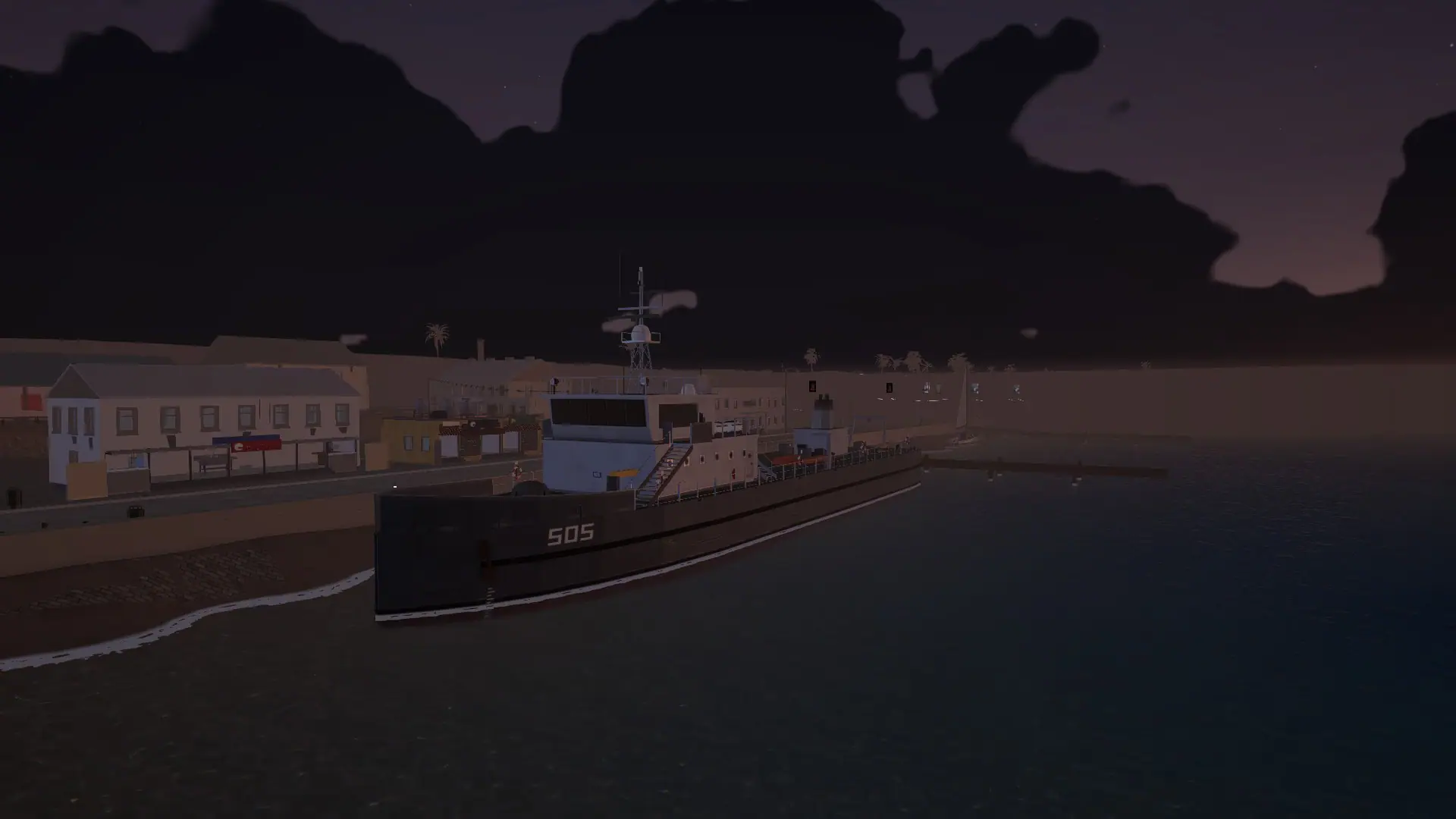 The harbour quay under a heavy sky