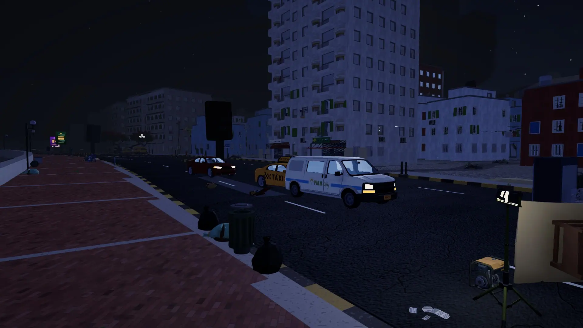 A street on the Alexandria corniche at night, parked cars and nobody around — in-game screenshot